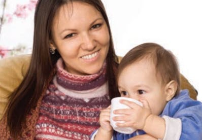 woman and baby drinking from a cup