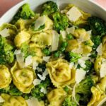 Tortellini and broccoli with parmesan cheese in a Bowl