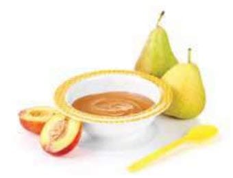 Pears and peaches and a bowl of pureed baby food