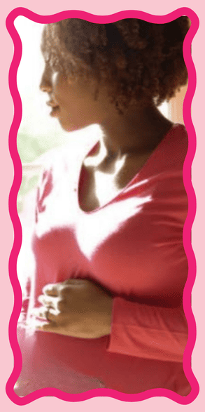 Pregnant woman holding her belly