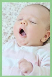 A baby yawning