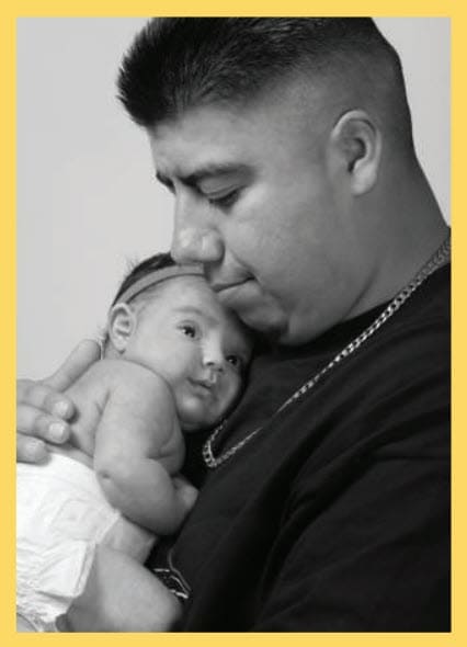 A man holding a baby