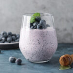 Blueberry yogurt chia pudding in a glass cup