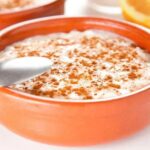 Dairy-Free Quinoa Pudding in an orange bowl