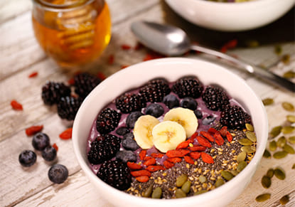 Pretty Darn Smoothie Bowl with berries and seeds and granola