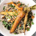 Roasted carrots and creamy quinoa in a bowl