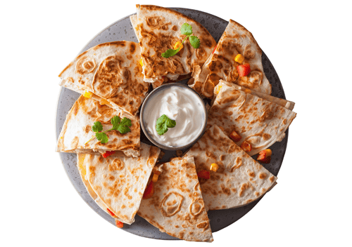 Quesadilla on a plate with yogurt.