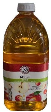 Bottle of apple juice labeled 100% juice from concentrate, with apples pictured on the front.