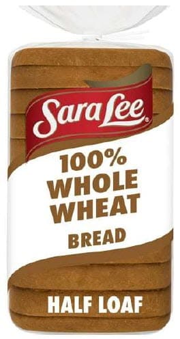 Package of Sara Lee 100% whole wheat half‑loaf bread in clear plastic wrapping