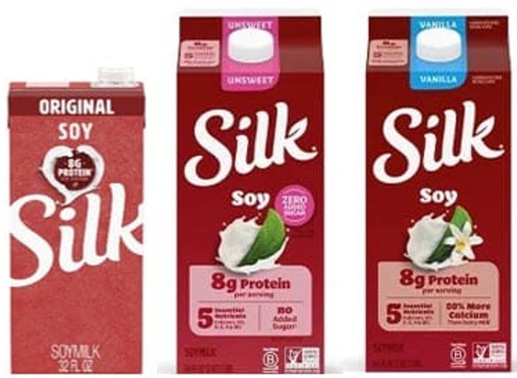 Three cartons of Silk soy milk side by side